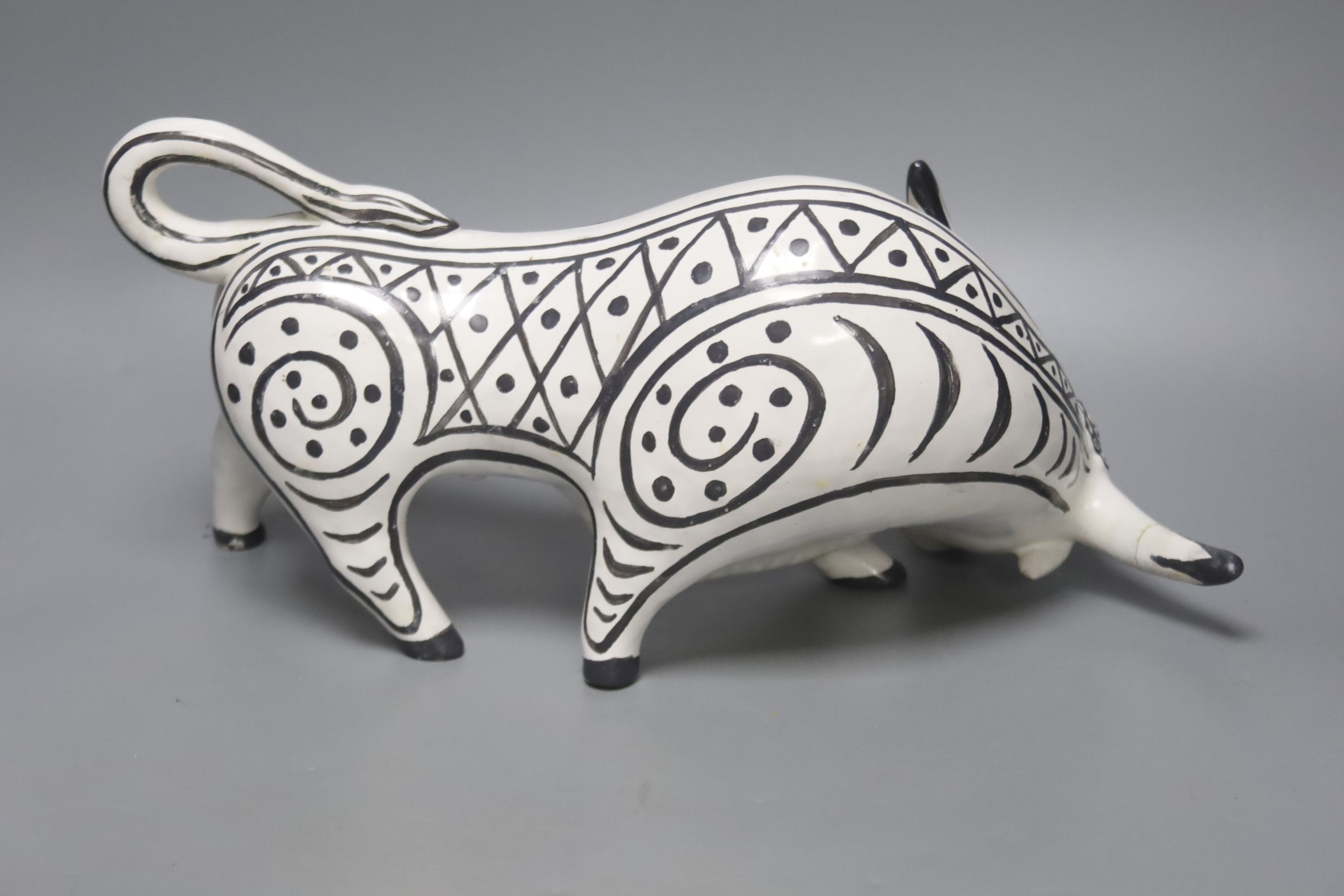 A large ceramic model of a bull, in the style of Picasso, length 13cm height 18cm (a.f.)